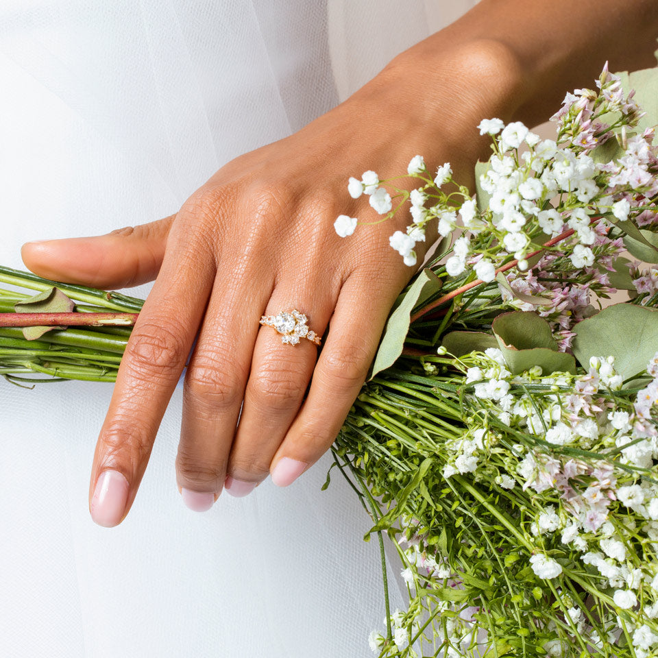product_details::White Diamond Crescent Ring on model.