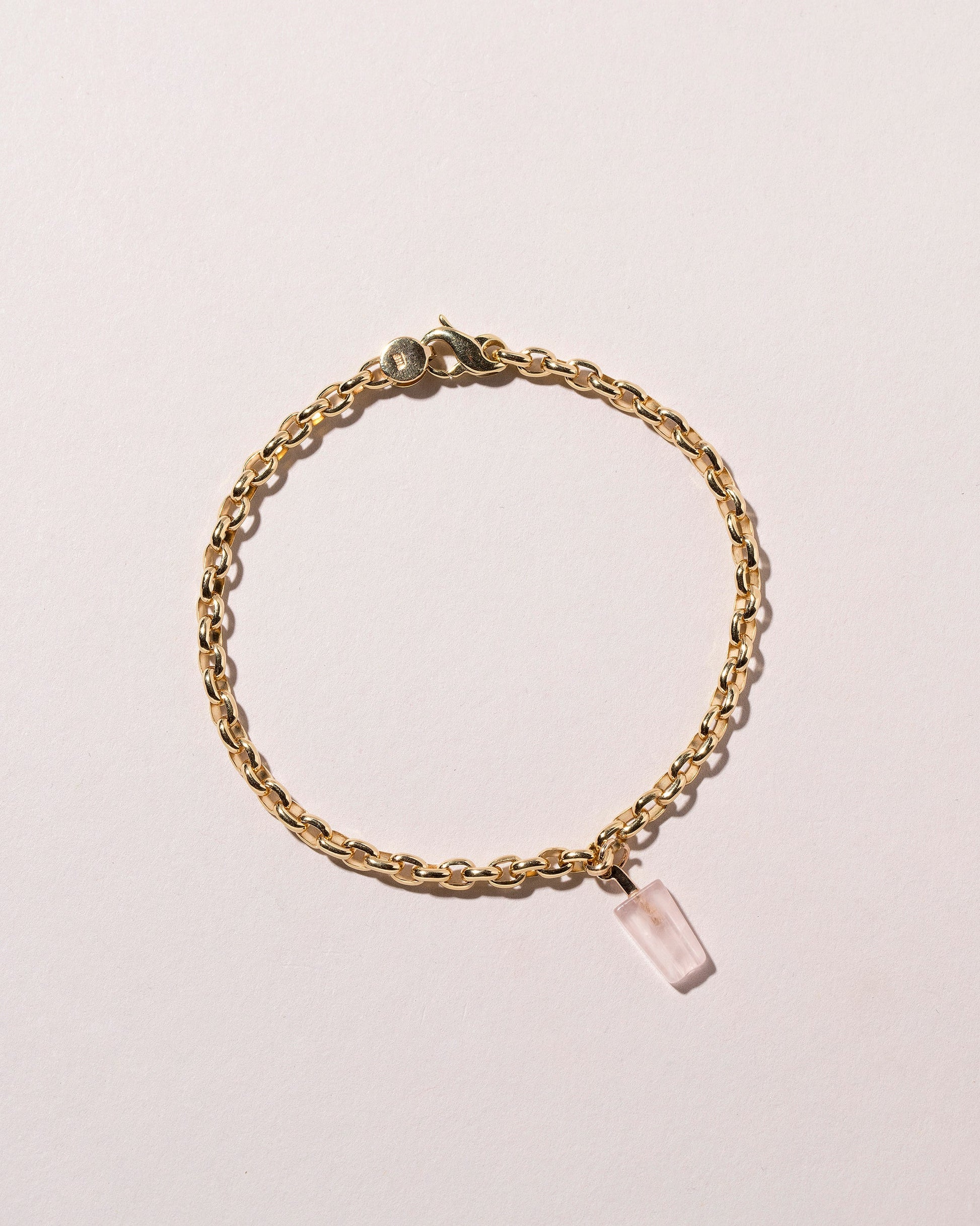 Popsicle Charm - Strawberry on light color background.