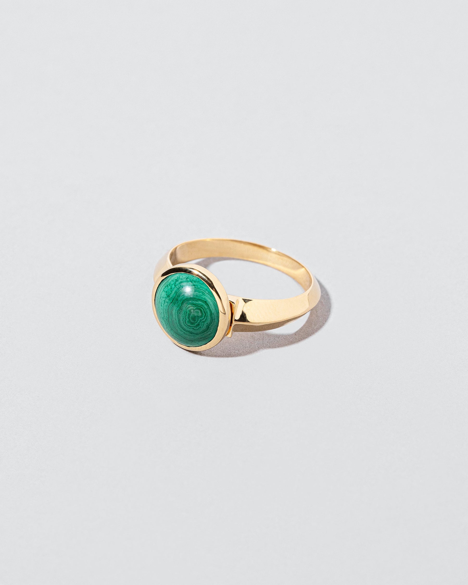 Secret Ring set malachite on light color background.