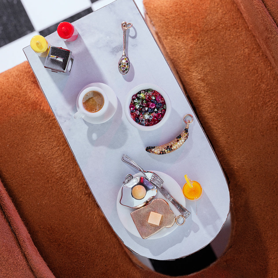 product_details::Styled photo featuring Cereal Spoon Charm