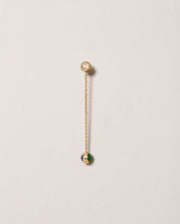 Birthstone One-Drop Single Earring on light color background.