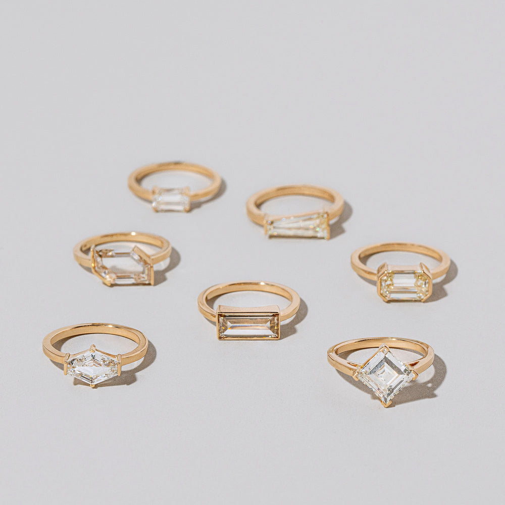 product_details::Group of Yesterday Rings on light color background.