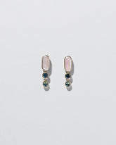 Luster Earrings on light color background.