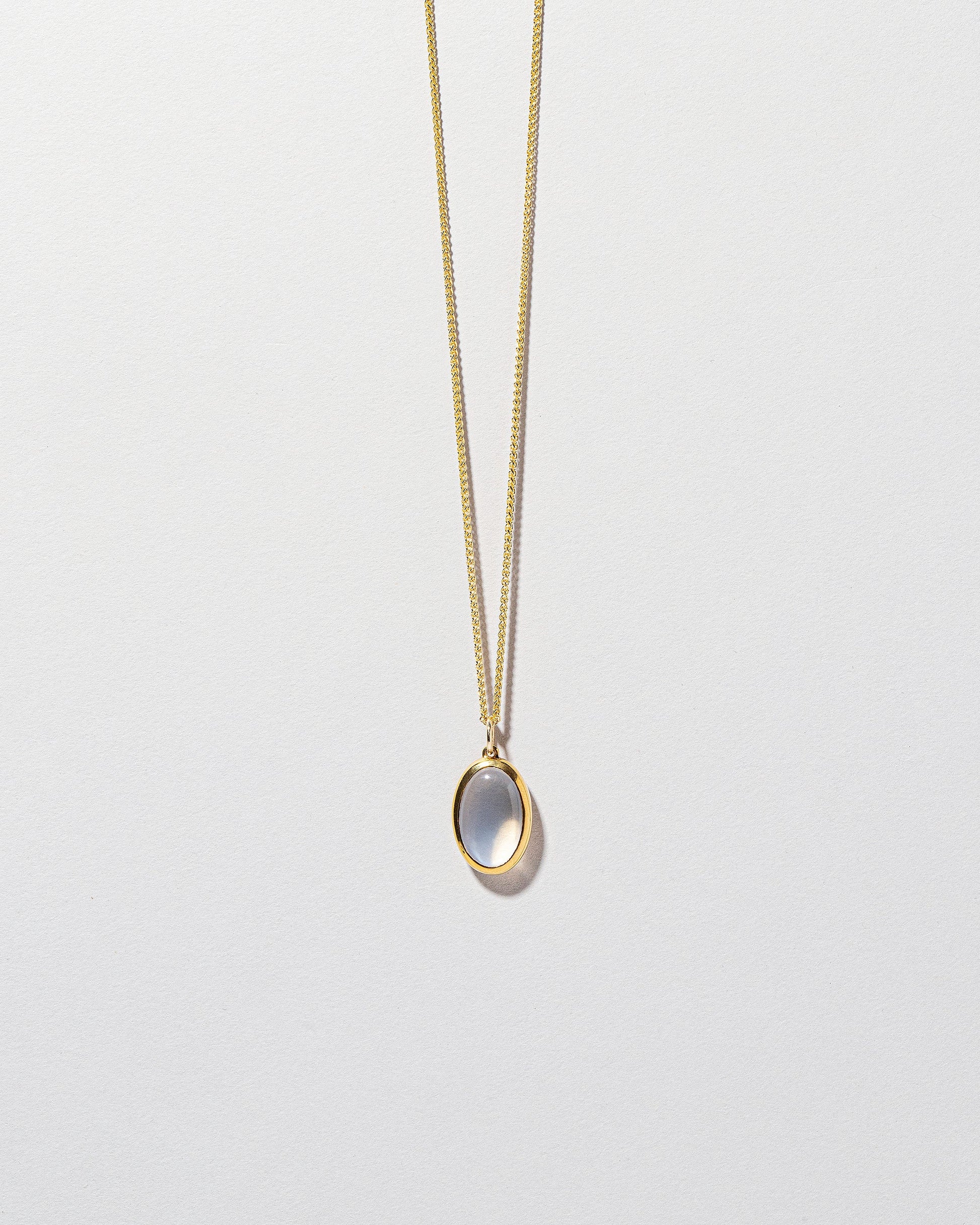 Moonstone Pendant on light color background.