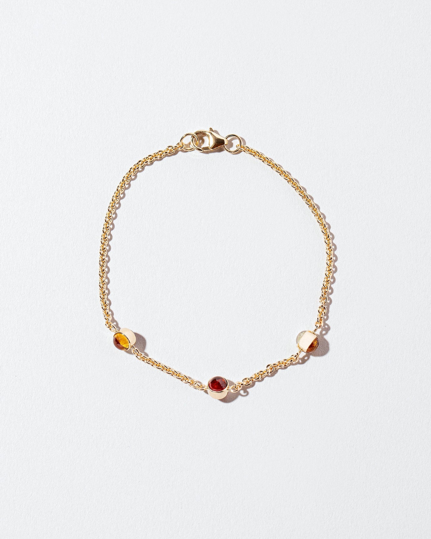  Birthstone Bracelet - Three Bezels on light color background.