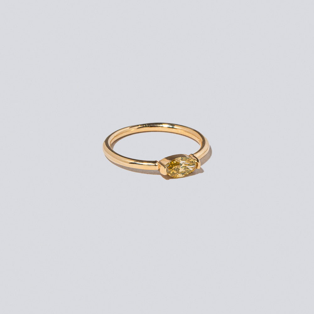 product_details::Closeup details of the Devant Ring on light color background.