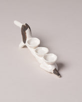 View from the back of the Eleonor Boström Baggage Dog on light color background.