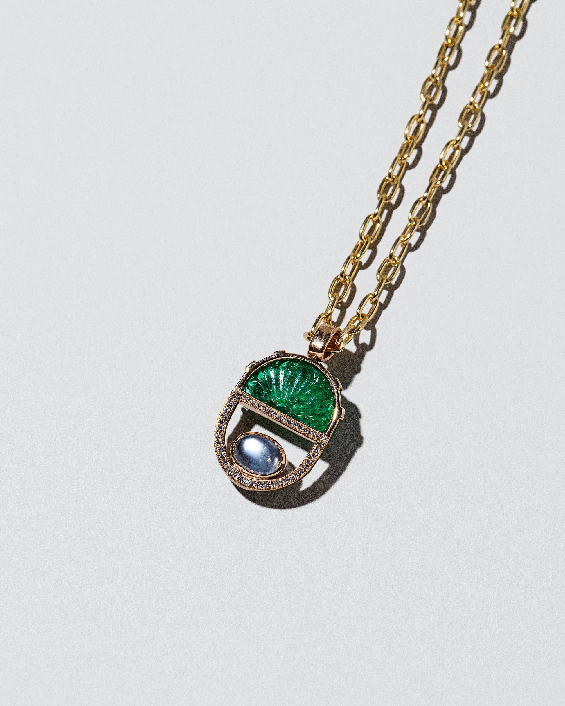Cosmic Realm Necklace on light color background.