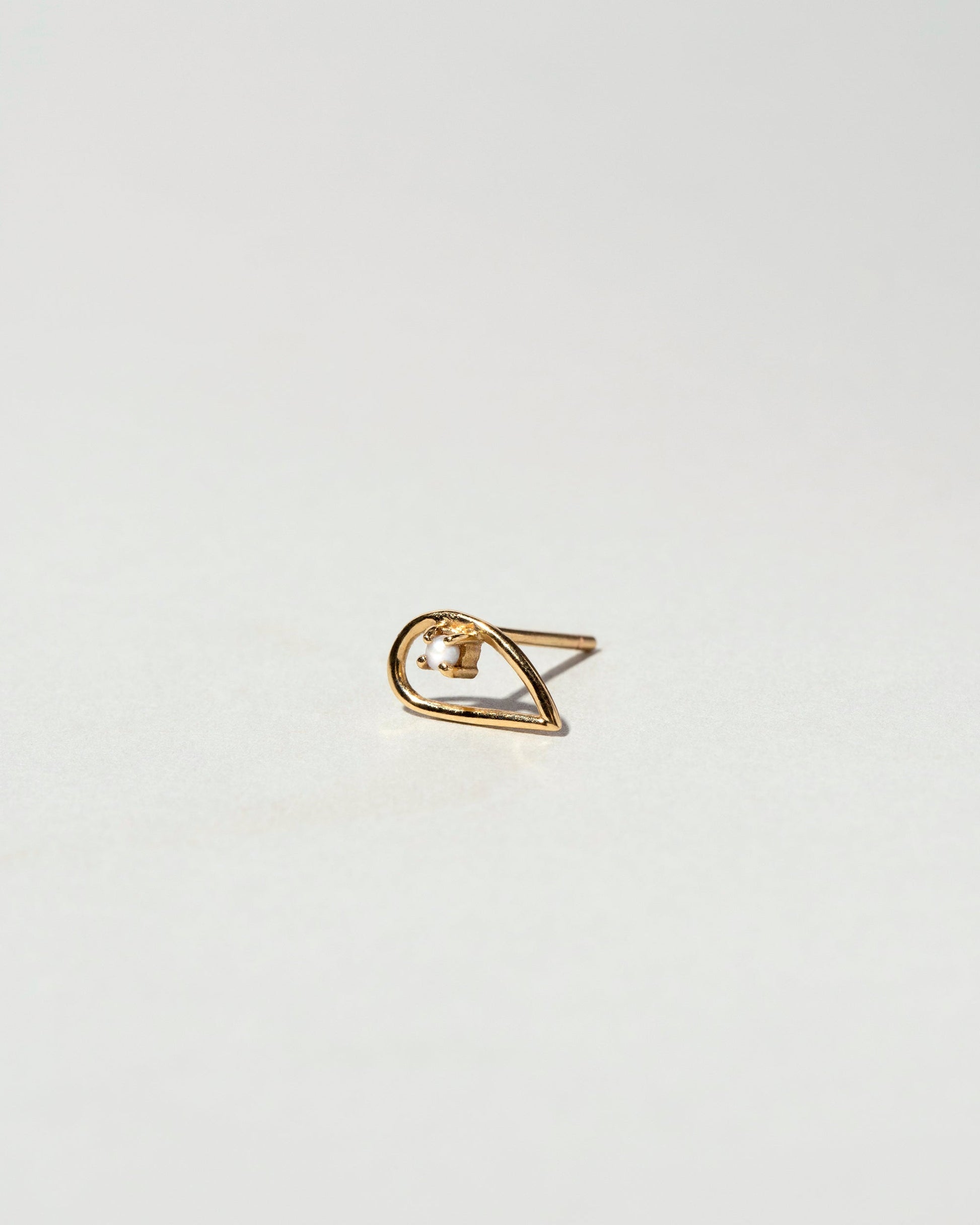 Sun Drop Single Stud on light color background.