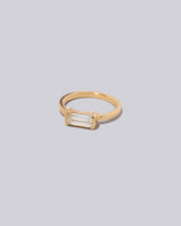 View from the side of the Vibrato Ring on light color background.