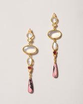 Moonstone & Alaskan Rhodolite Earrings on light color background.