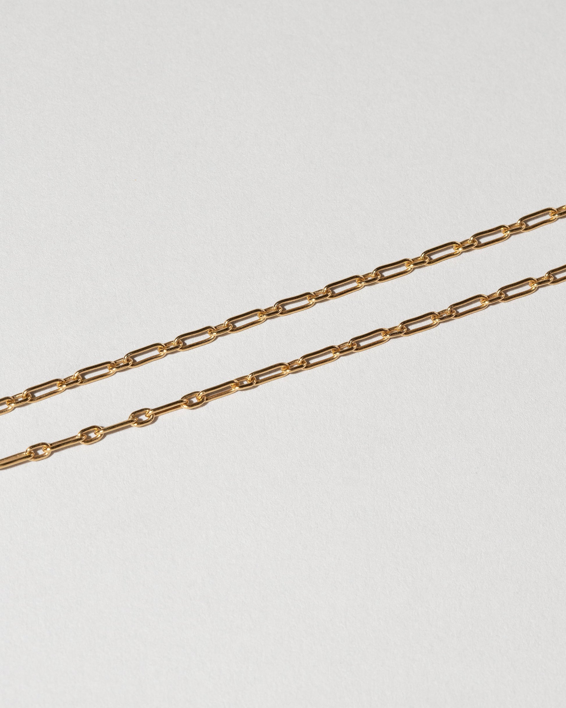 Hotdog Chain Necklace on light color background.