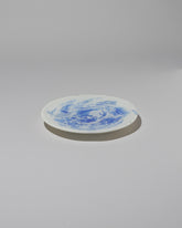 Stories of Italy Blue Nougat Dessert Plate on light color background.