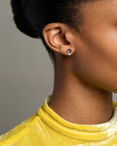 Vega Earrings - Dark Spinel on model.