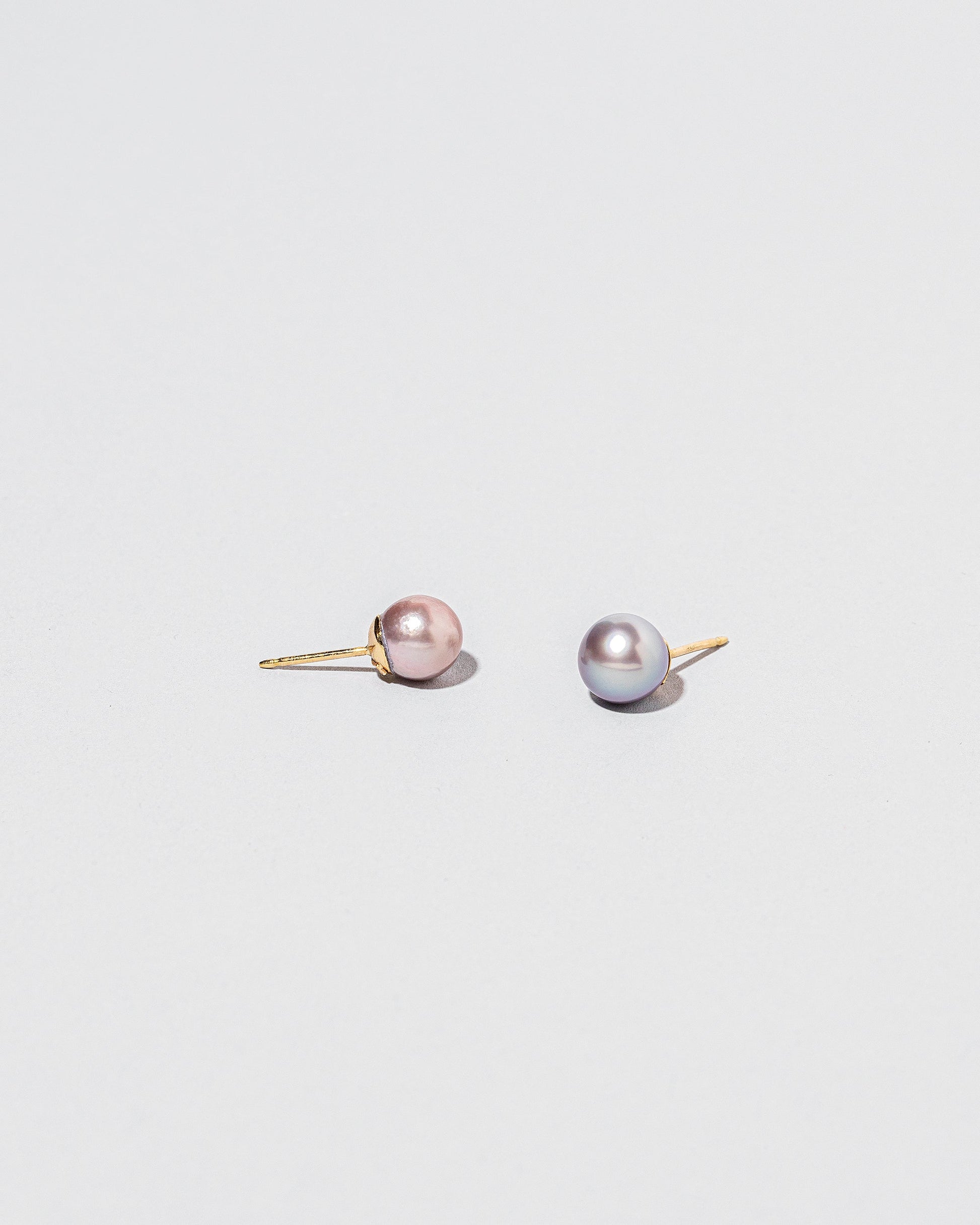 Soft Landscape Earrings, shown as studs, on light color background.