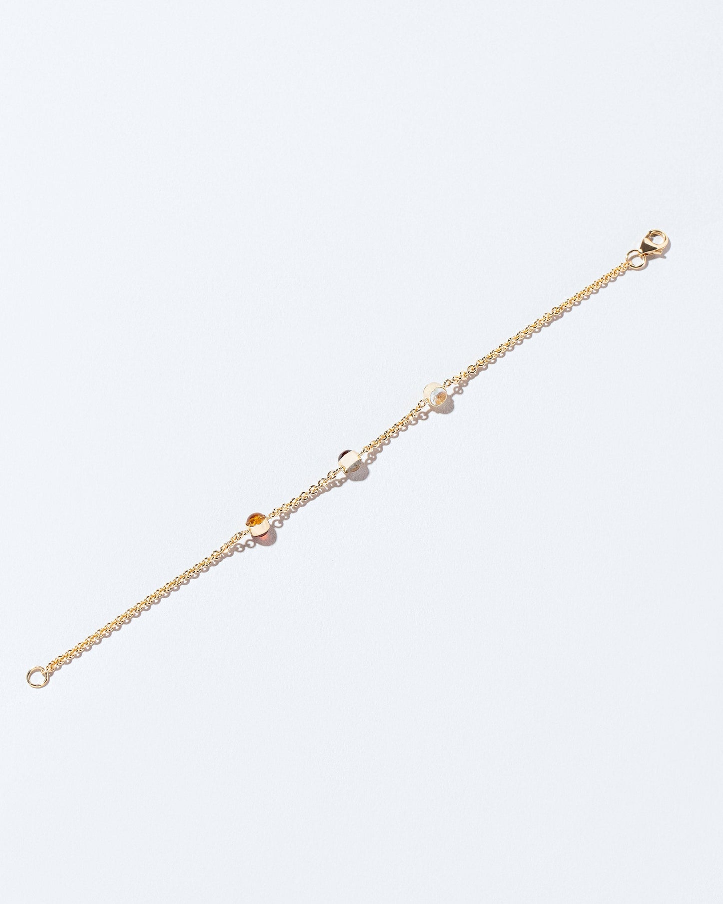  Birthstone Bracelet - Three Bezels on light color background.