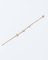 Birthstone Bracelet - Three Bezels on light color background.