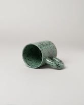 Detail view of Recreation Center Dalmation Jasper Mandy Mug on light color background.