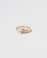 One & The Others Ring on light color background.