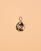 Salt Bagel Charm with Cream Cheese - Final Sale on light color background.