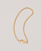 Manifestation Bracelet on light color background.