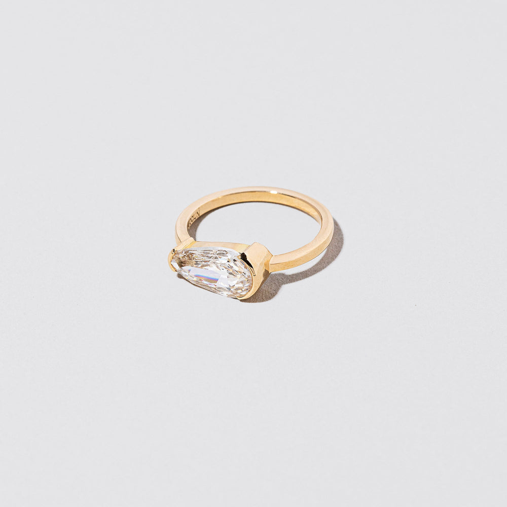 product_details::Closeup details of the Divination Ring on light color background.