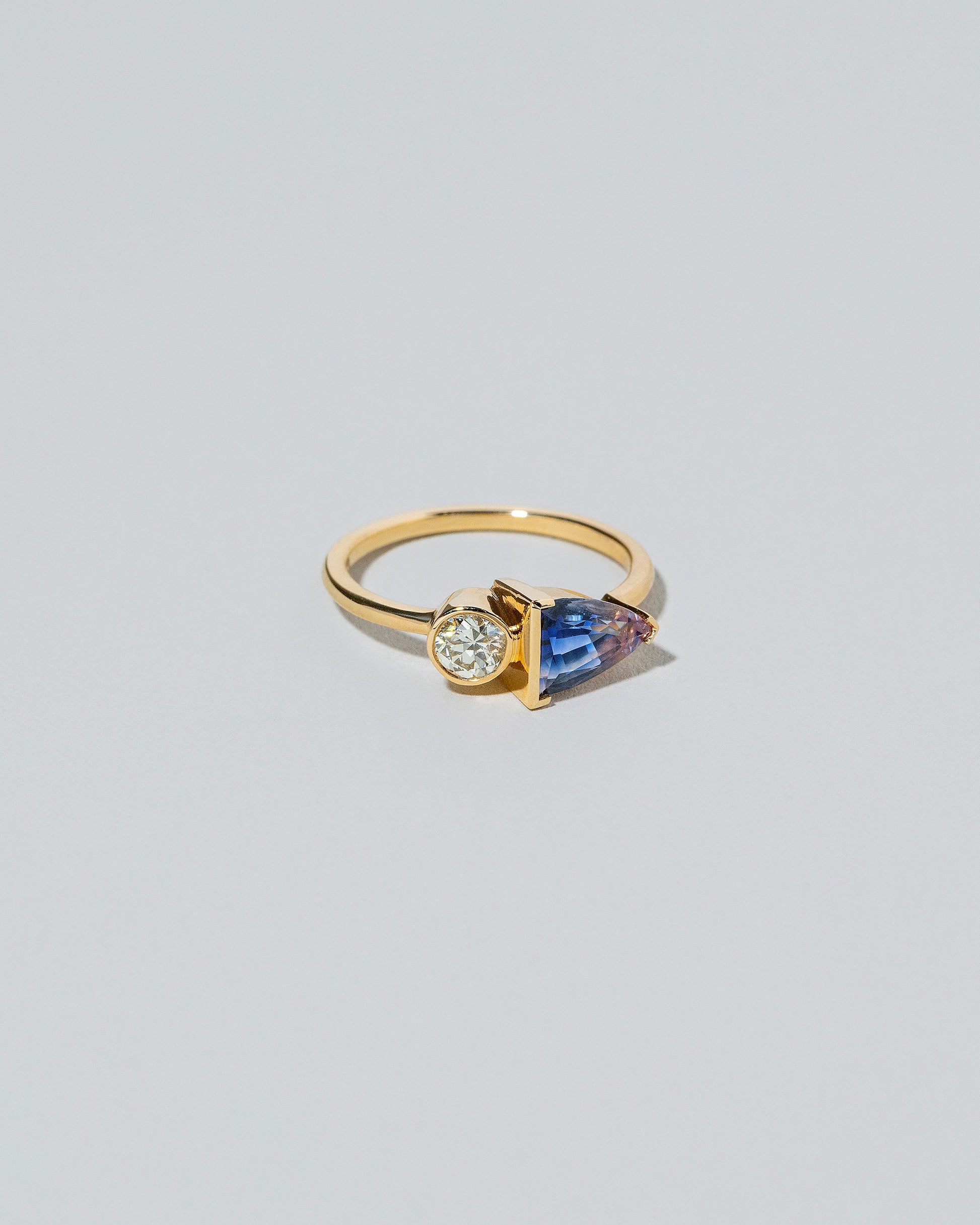 Greenwood Ring on light color background.