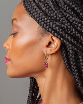 Tiny Loop Hoop with Small Table Grapes Charm on model.