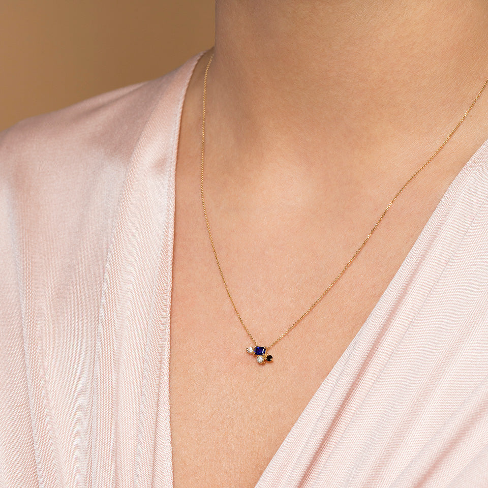 product_details::Cosmic Dawn Necklace on model.