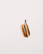 Hotdog Charm on light color background.