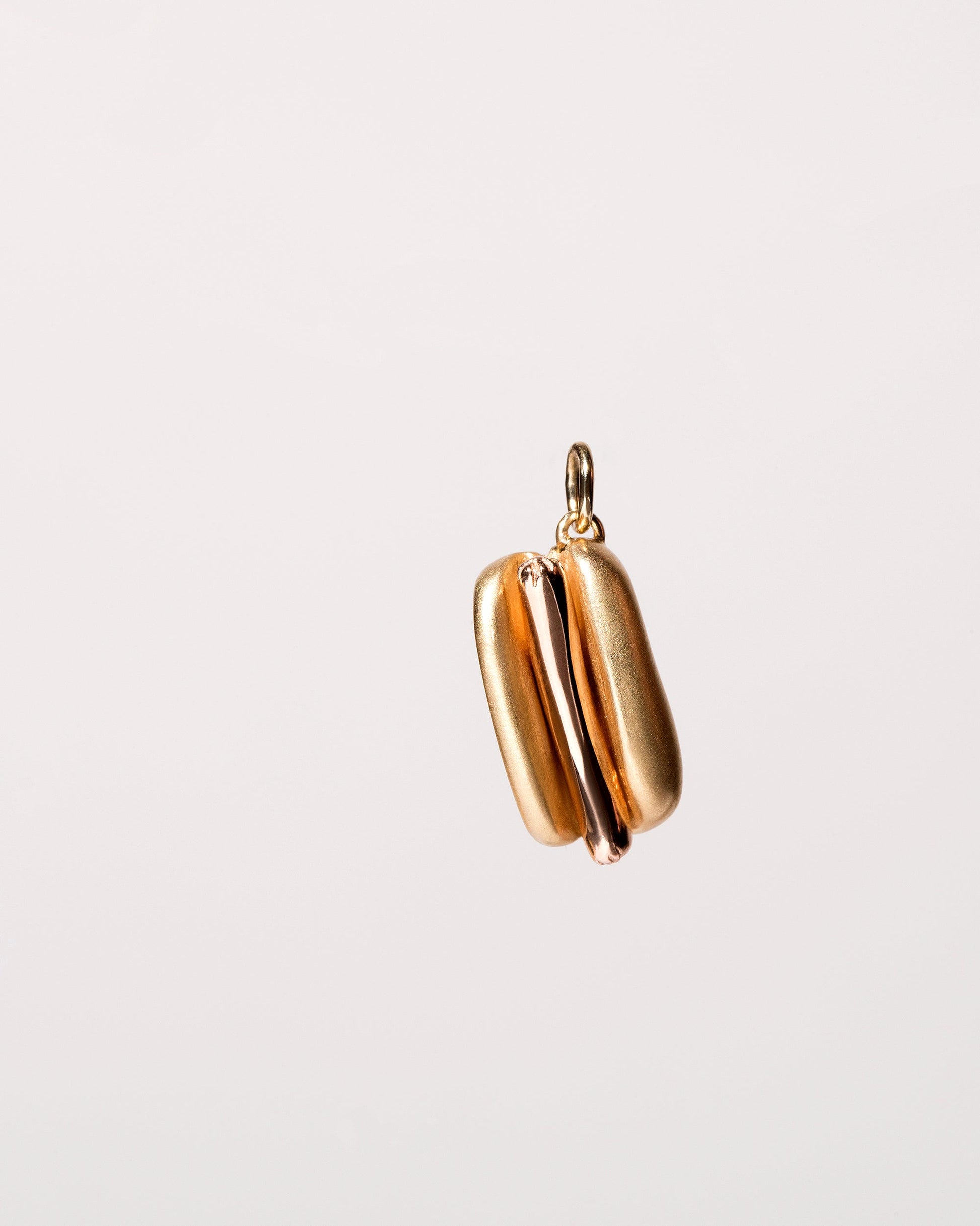 Hotdog Charm on light color background.