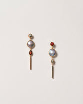 Act 2. Earrings 3 on light color background.