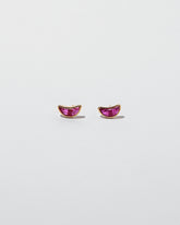 Fury Earrings on light color background.