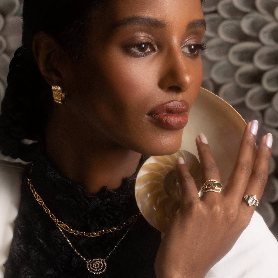 product_details::Styled photo featuring Duality Hoop Earrings.