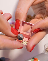 Black & White Cookie Charm and Chocolate Chip Cookie Charm on model.