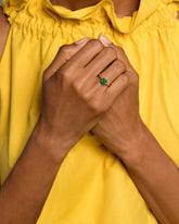 Sun & Moon Ring - Emerald on model.