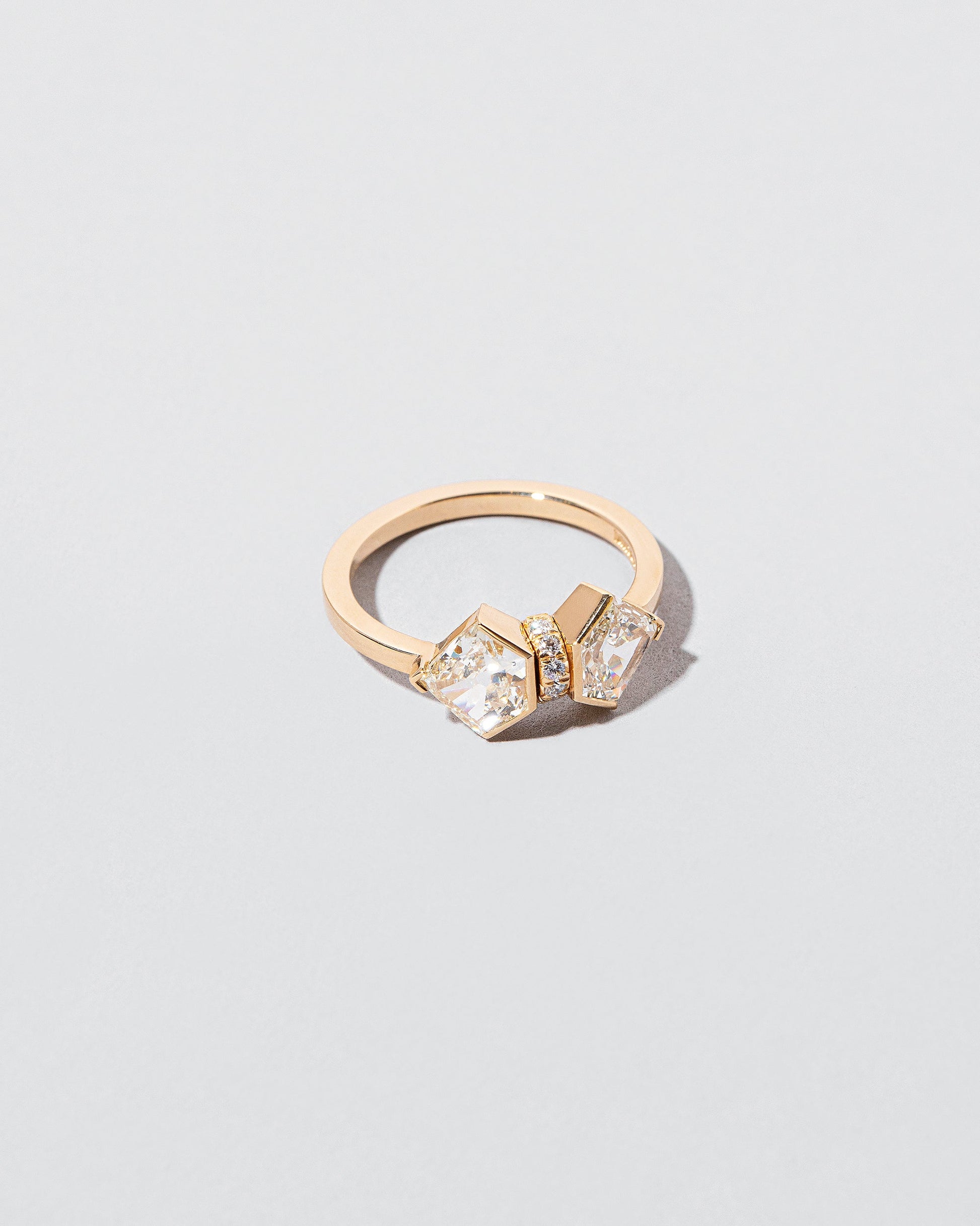 Alchemy Ring on light color background.