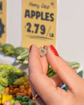 Styled image of the Half Red Apple Charm.