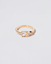 Sloane Ring on light color background.