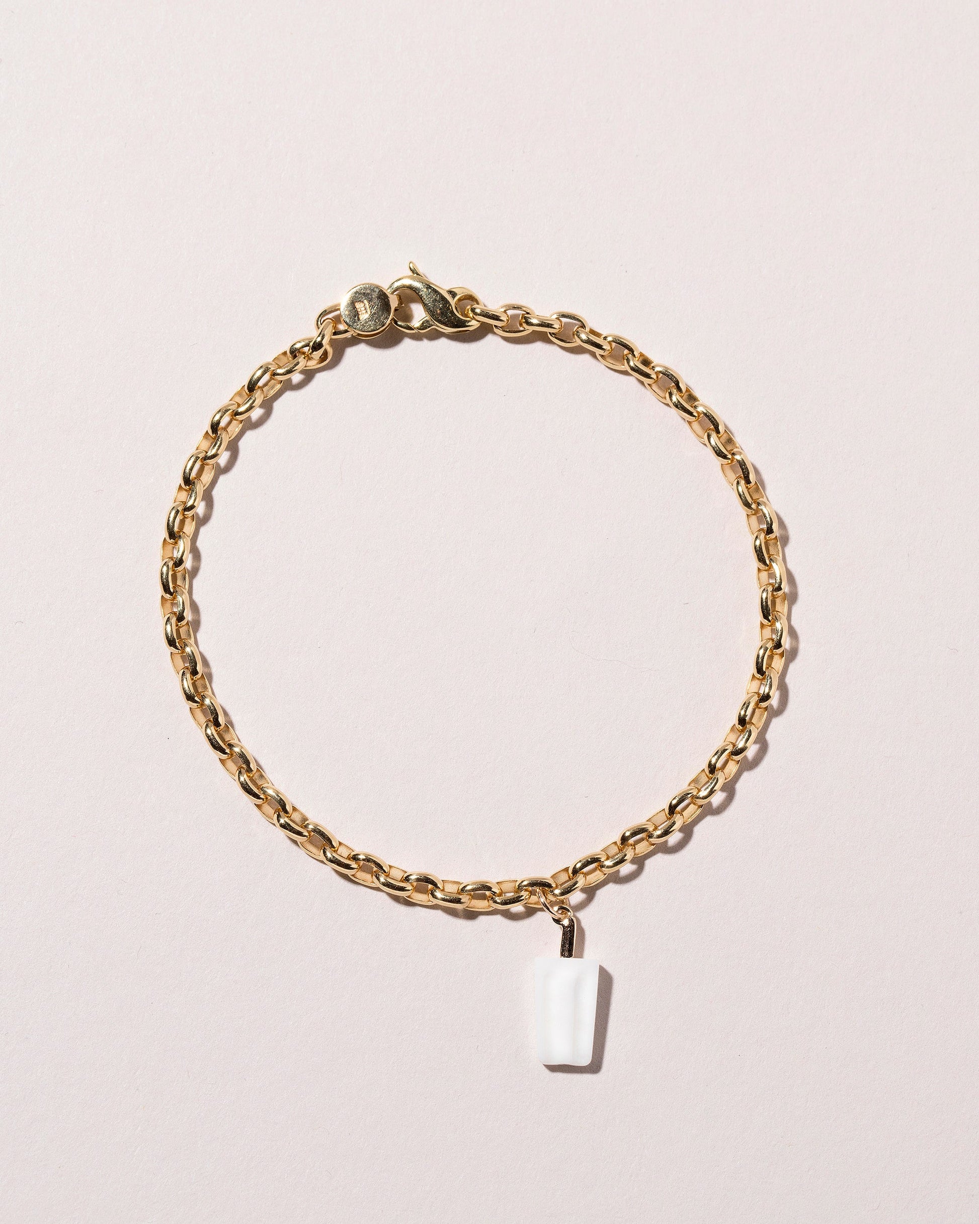 Coconut Popsicle Charm on light color background.