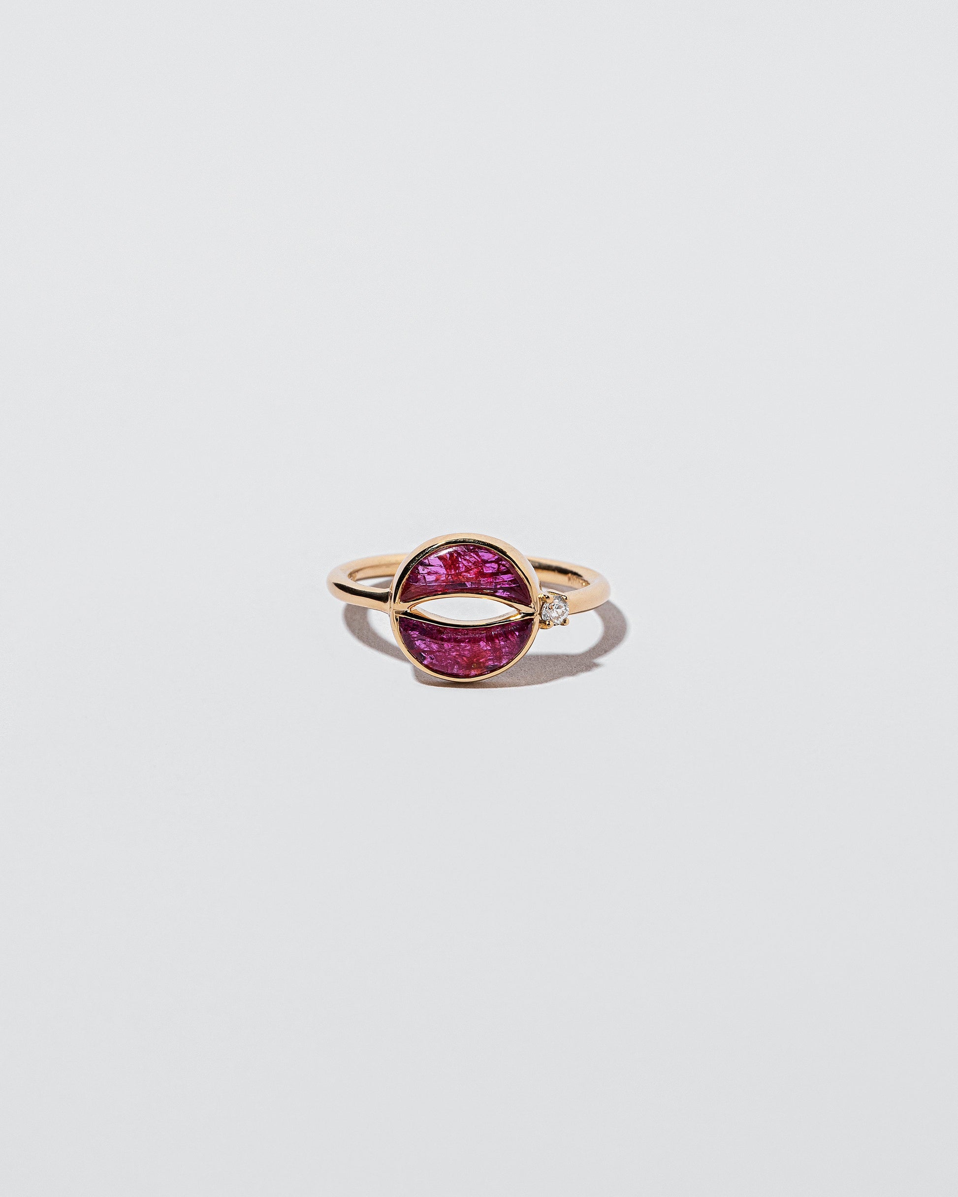 Rebirth Ring on light color background.