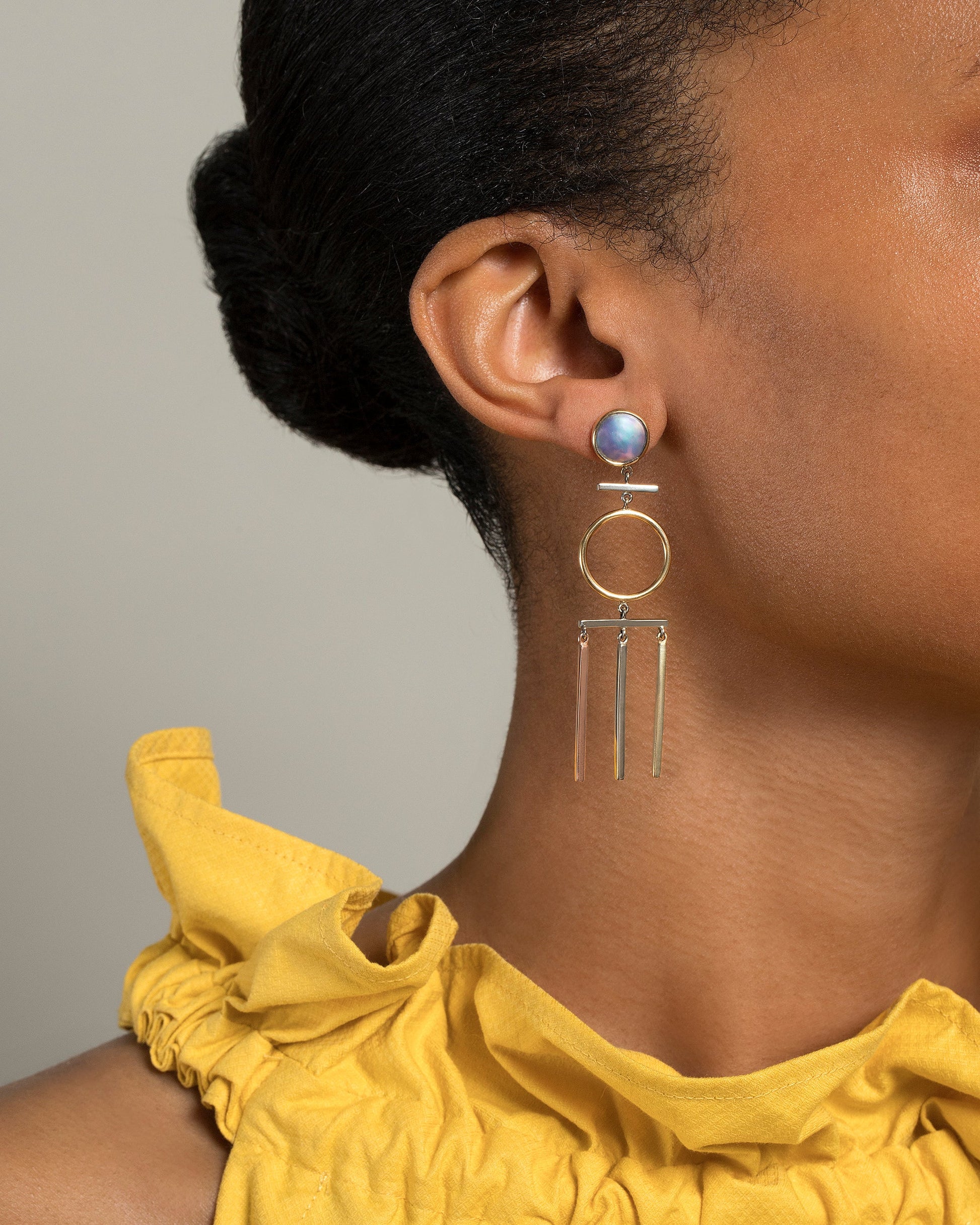 Figure 2. Drop Earrings on model.