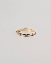Half Round Studded Band on light color background.