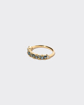 Eleven Trillion Ring - Teal Sapphire on light color background.
