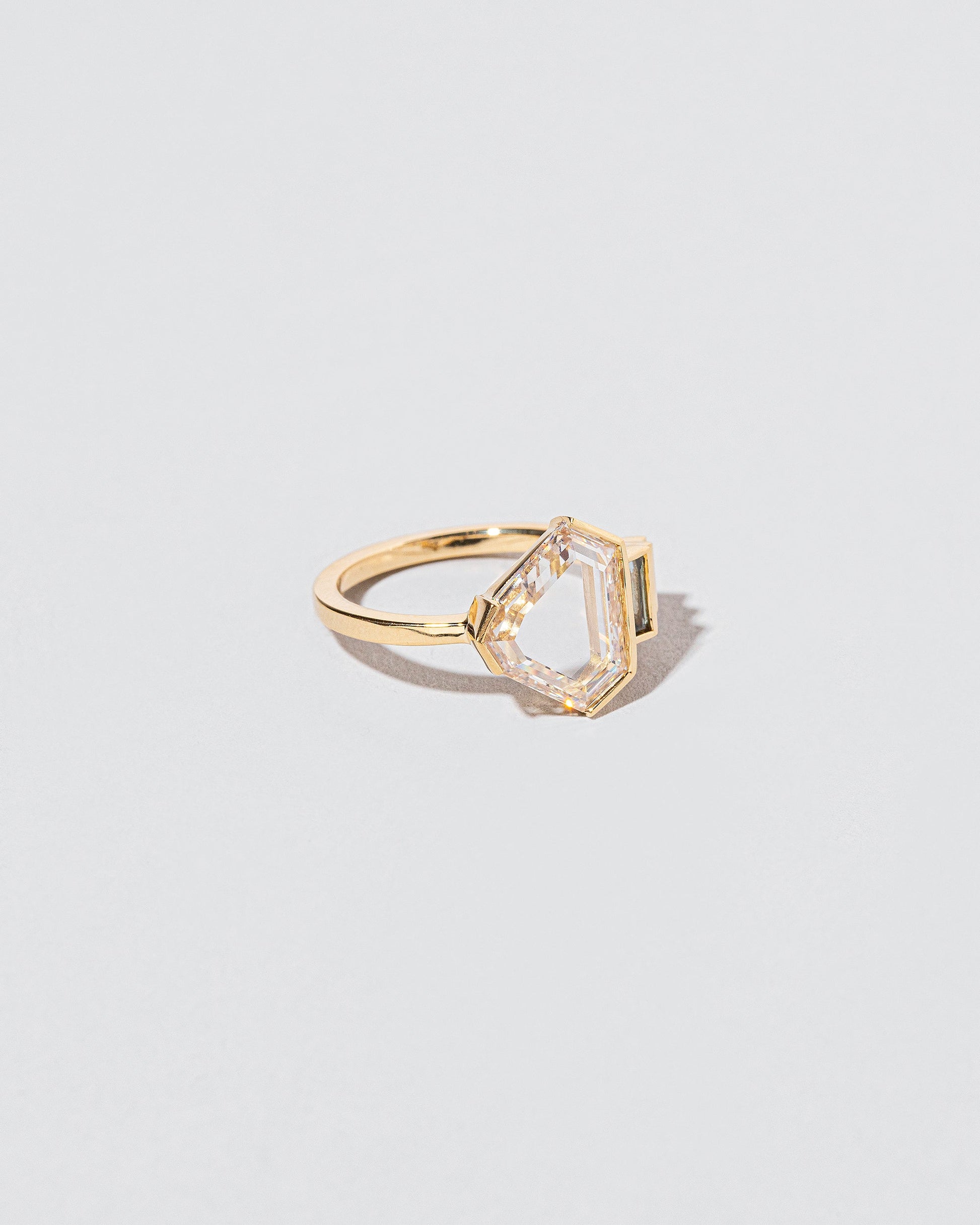 Transcendence Ring on light color background.
