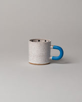 Recreation Center Blue Dot Mug on light color background