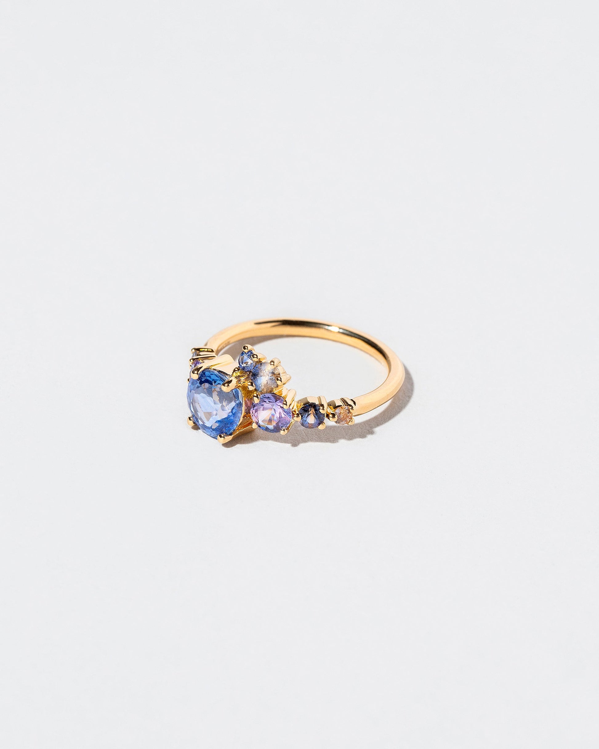 Luna Ring - Purple & Blue Sapphire on light color background.