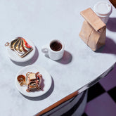 product_details::Styled image of the Tall Stack Pancake Charm, Orange Slice Charm and Avocado Toast Charm.