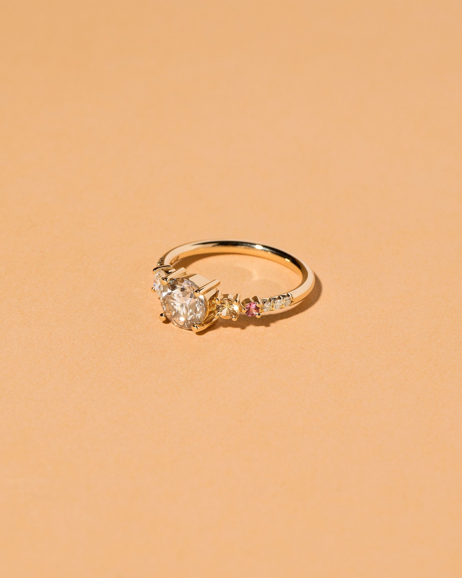 Rhea Ring on light color background.