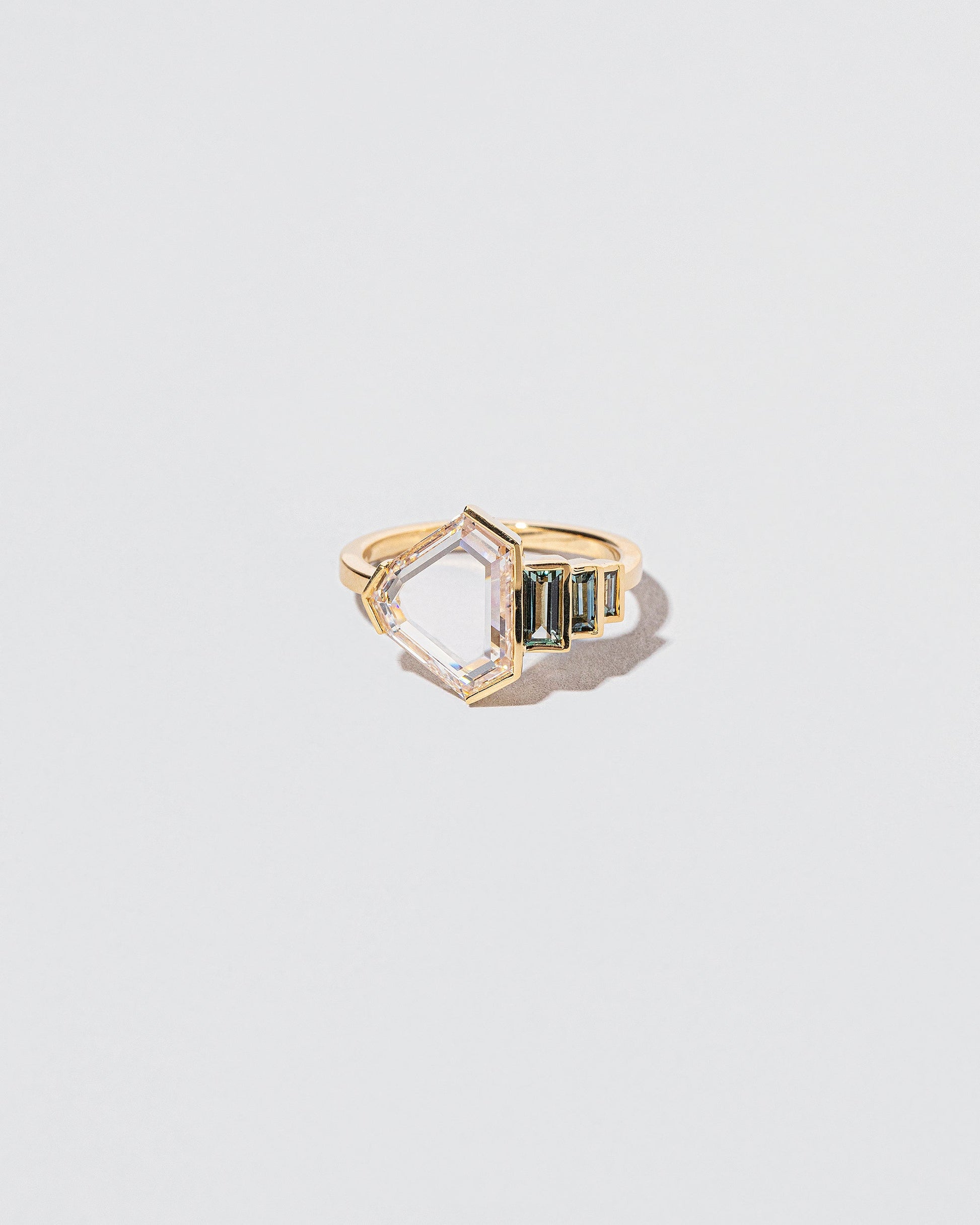 Transcendence Ring on light color background.